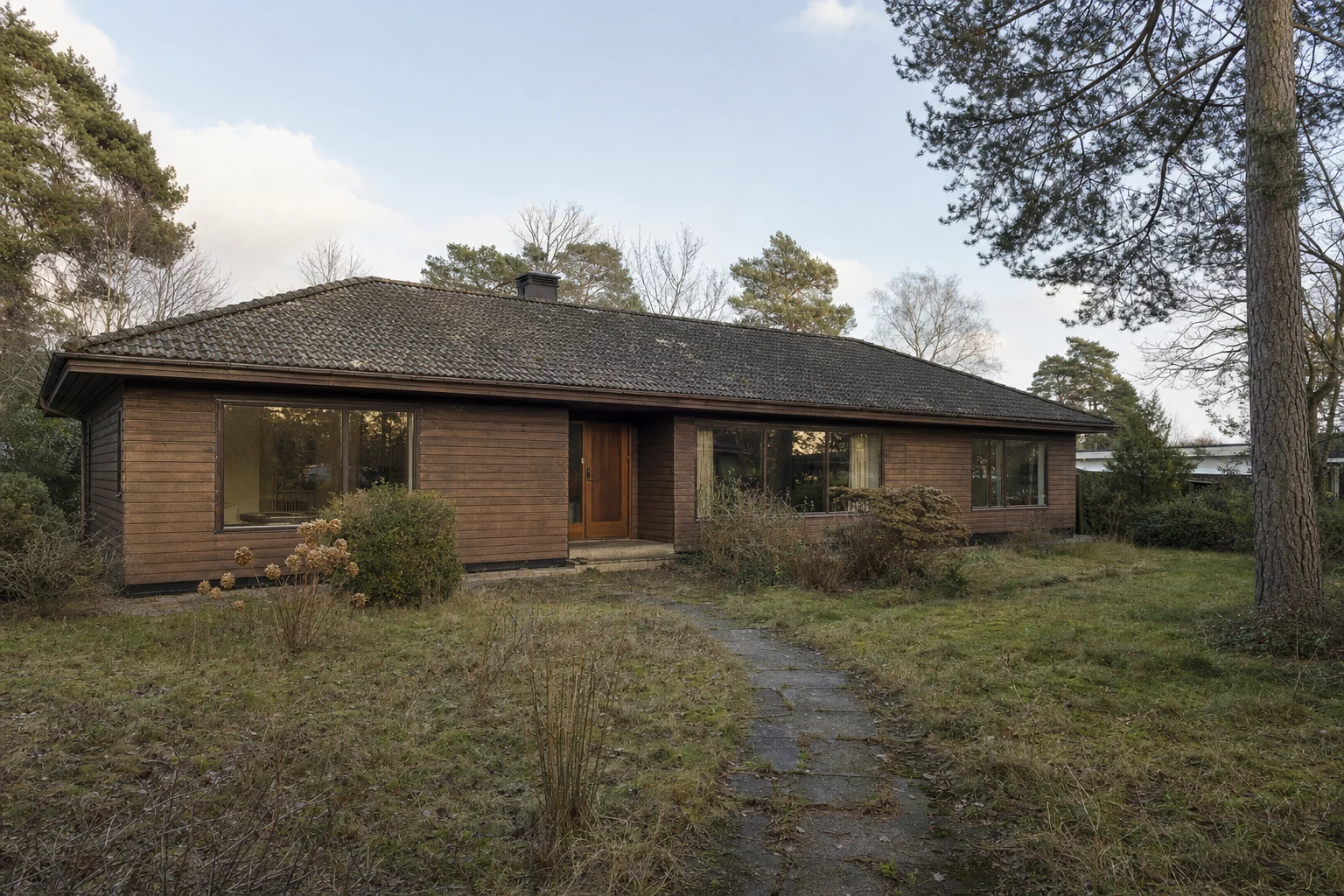 The same house before adding the planted borders and limestone path